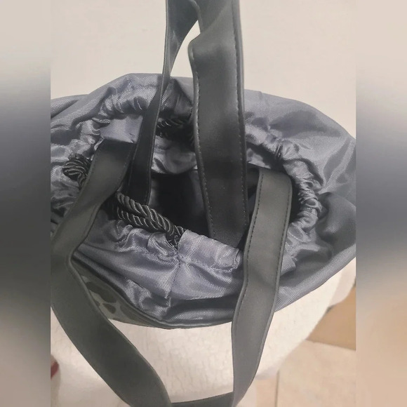 Tanger Outlet Animal Print Bookbag - Picture 4 of 5